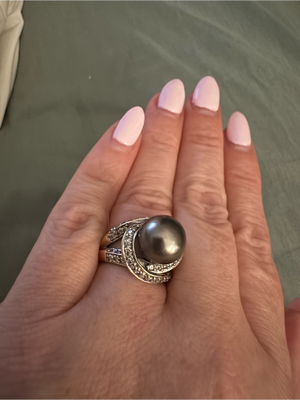 8mm black Tahitian pearl wrapped in diamonds 18k gold